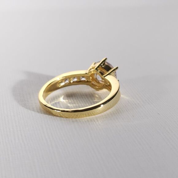 Simulated White Diamond Ring in a Goldtone Ring Size 8 - Picture 3 of 9